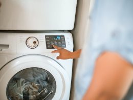 person using washing machine