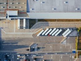 aerial view of vehicles in parking area