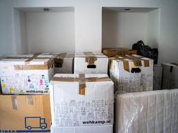 brown cardboard boxes on brown wooden table