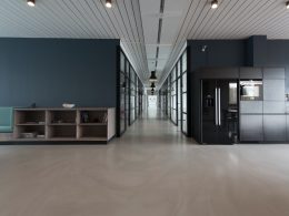 architectural photography of black and brown hallway