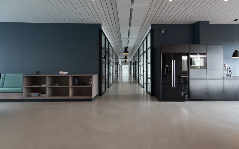 architectural photography of black and brown hallway