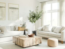 a living room filled with furniture and a large window