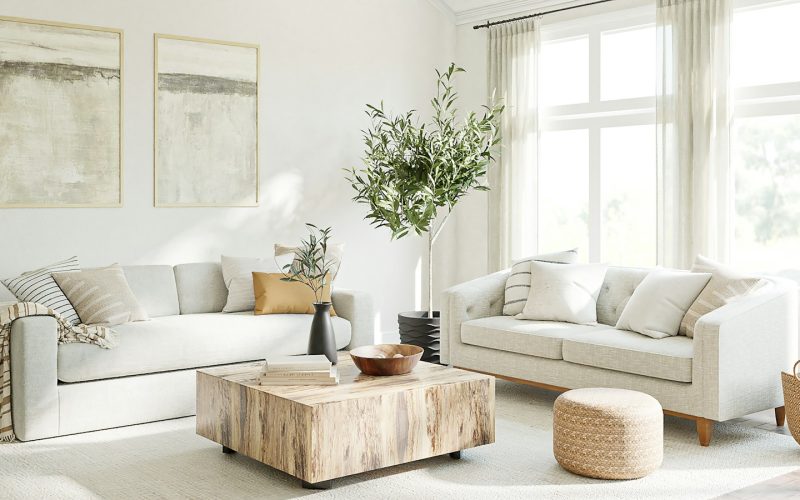 a living room filled with furniture and a large window