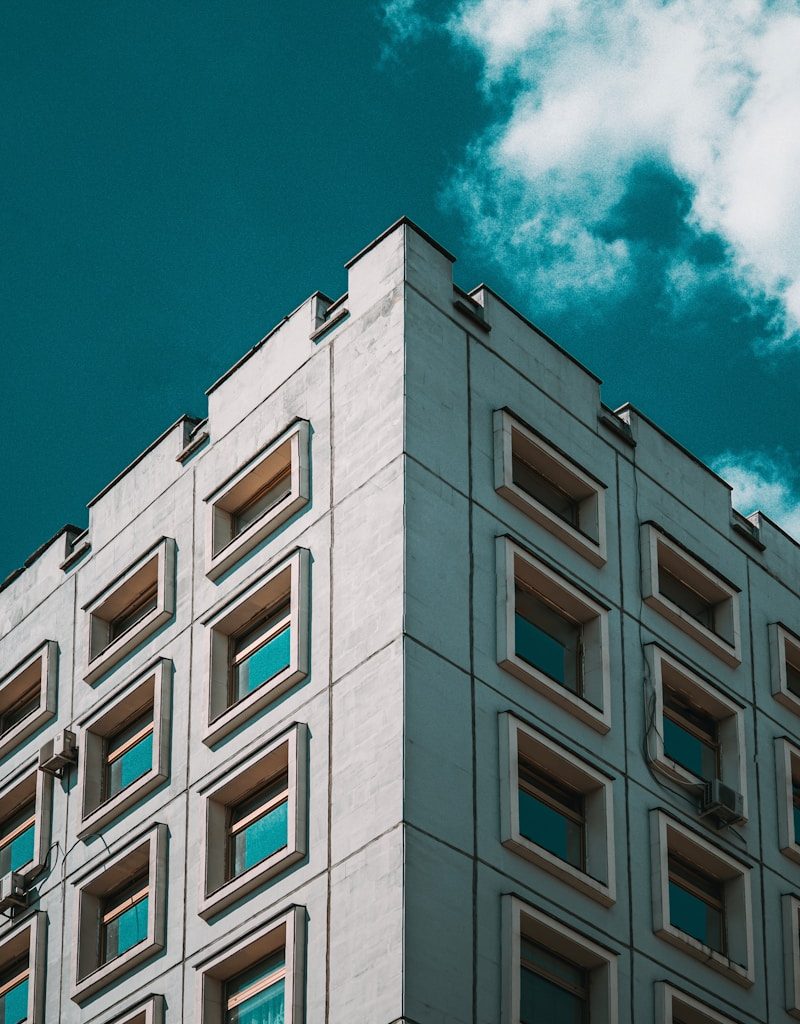 brown concrete building under blue sky during daytime