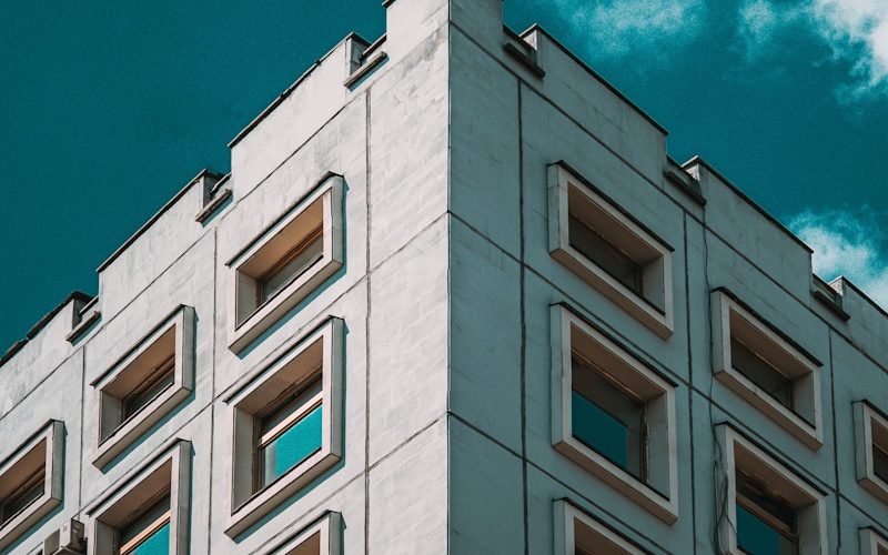 brown concrete building under blue sky during daytime