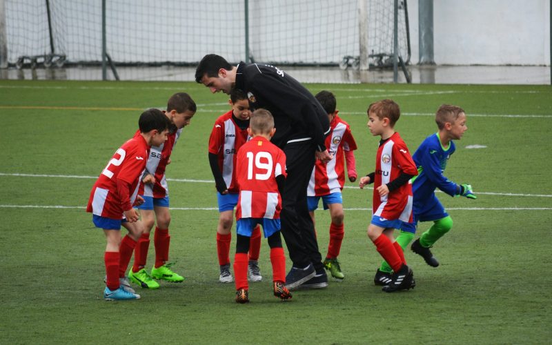 children playing soccer