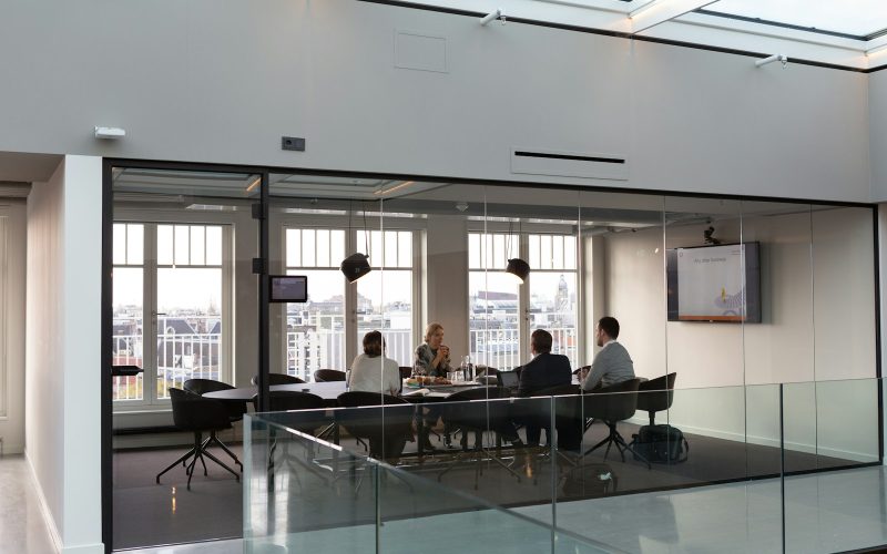 people sitting on chair inside building