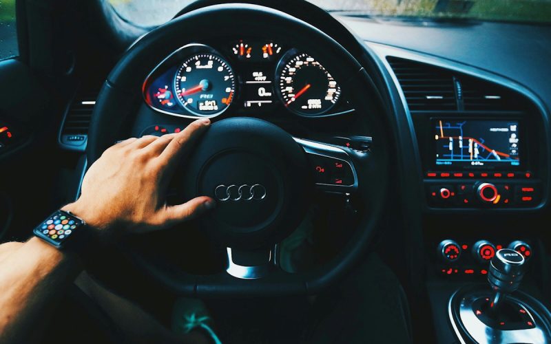 black Audi vehicle steering wheel