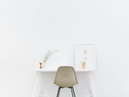 white wooden table near brown chair