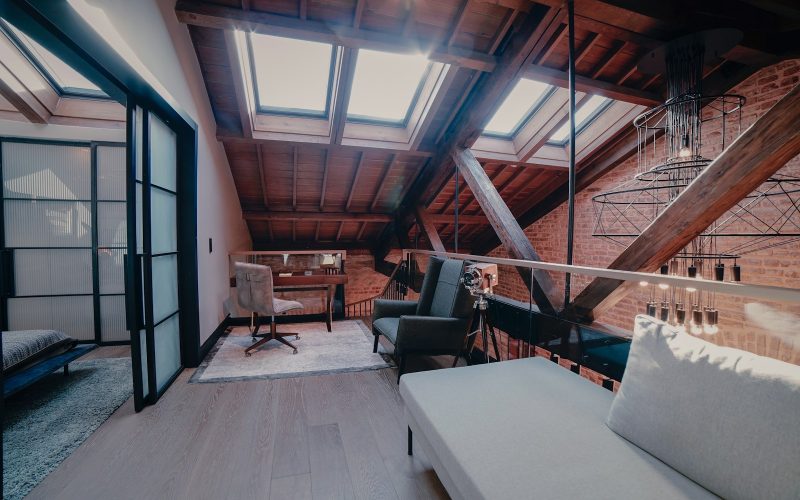 white wooden table near brown wooden chairs