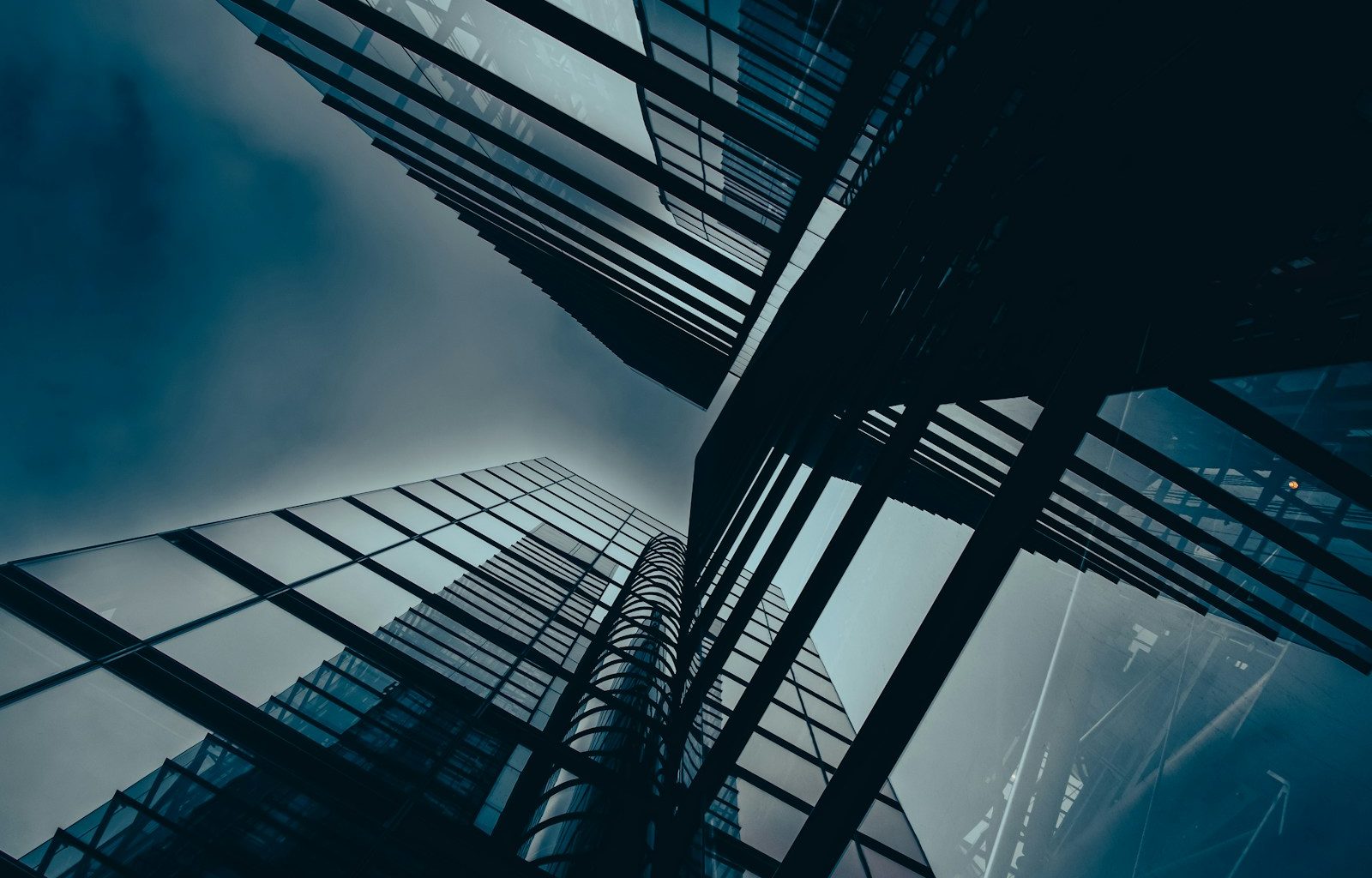 a group of tall buildings towering up into the sky