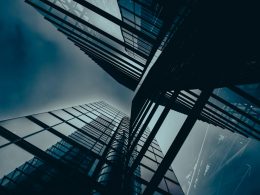 a group of tall buildings towering up into the sky
