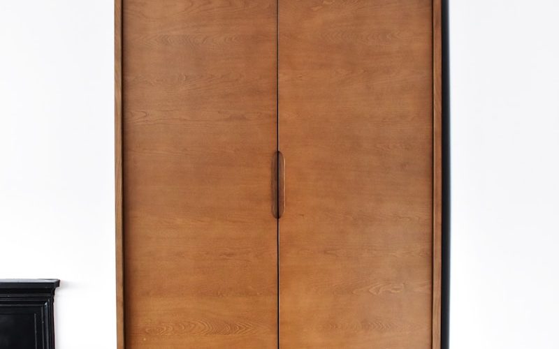 brown wooden 2-door cabinet