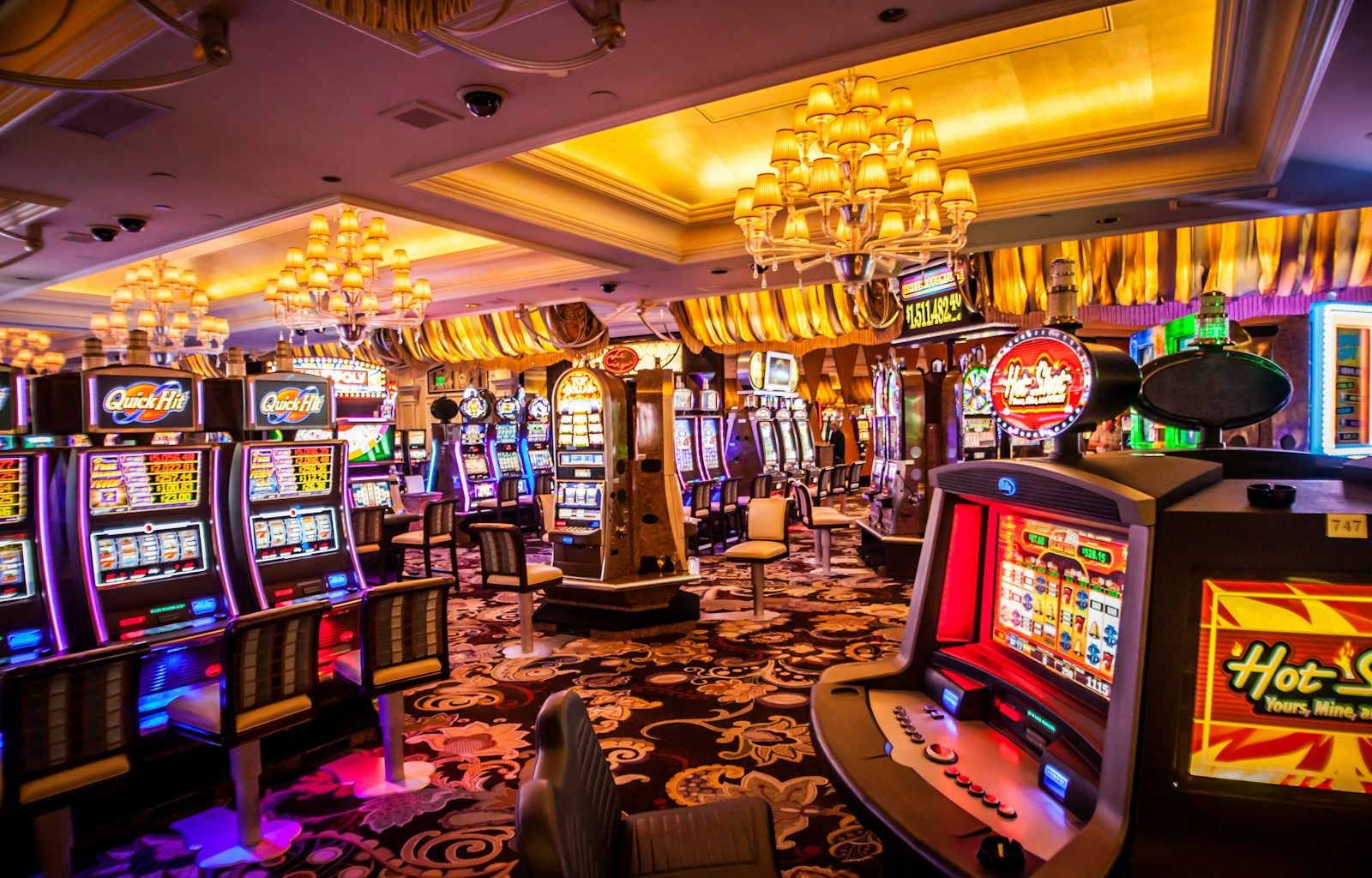 arcade machine with lights turned on inside room