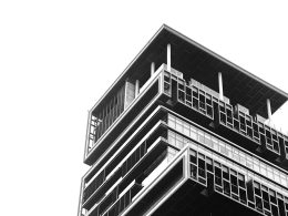 a black and white photo of a tall building